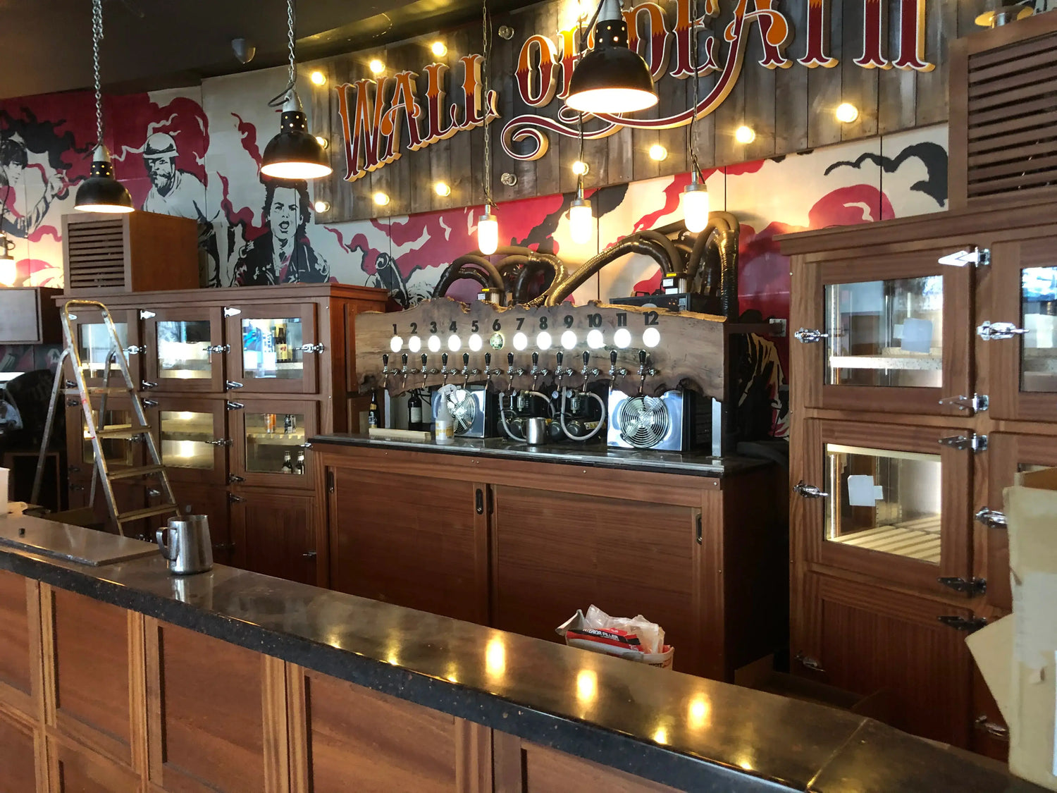 Beverage Cooling Company commercial bar installation showing 2 x 6-line CWP-300 Digital units with a 12 line Lindr Compensator Tap Wall