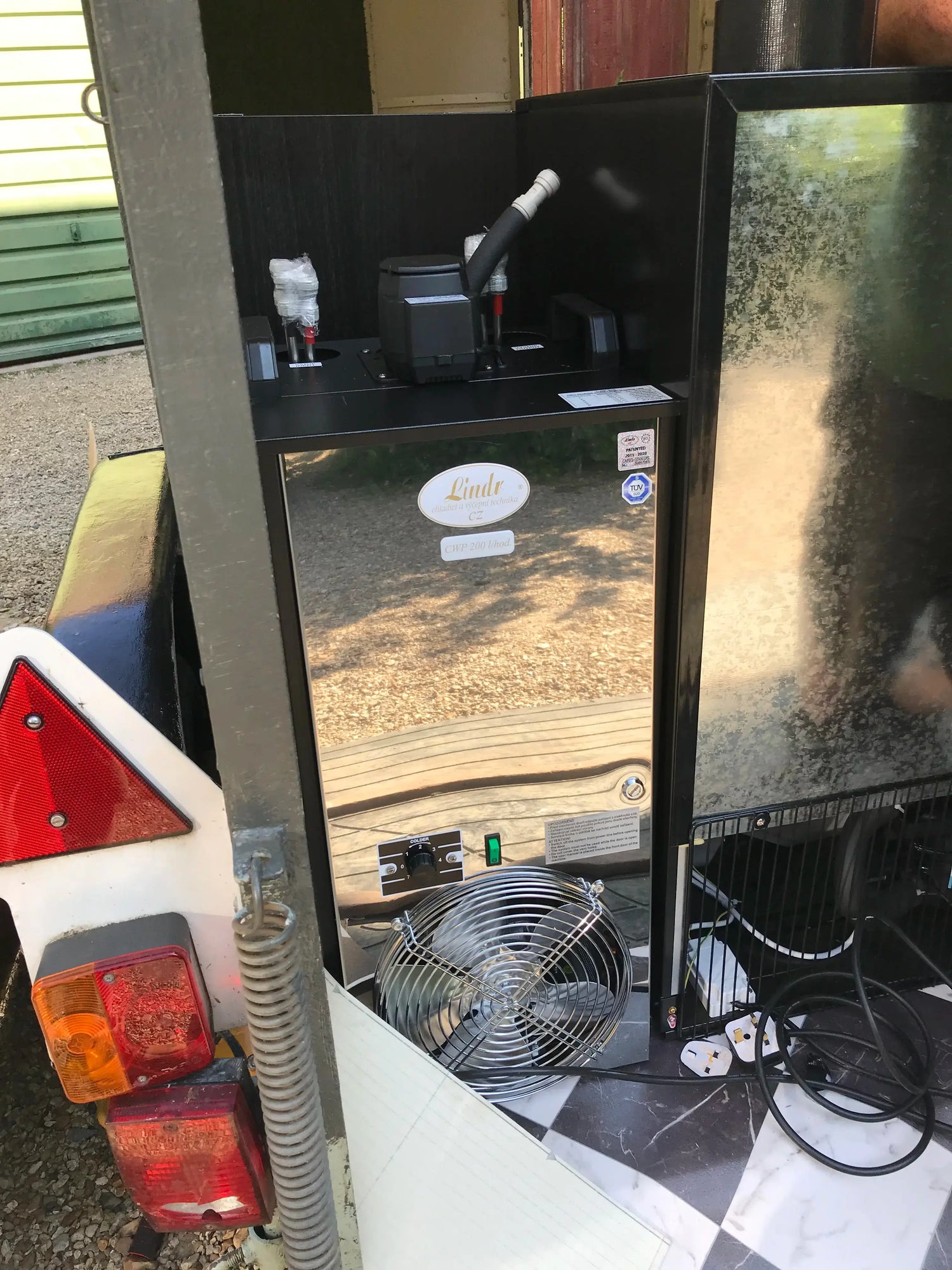 Beverage Cooling Company Lindr CWP-200 installed next to bottle fridge in horsebox bar conversion