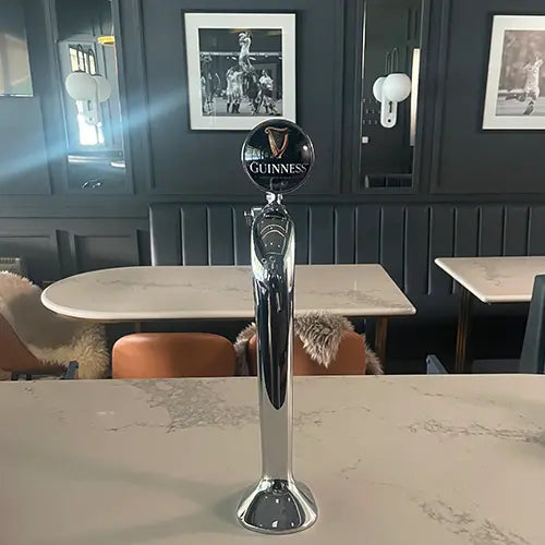 The Beverage Cooling Company Lindr Cobra font with Guinness badge 